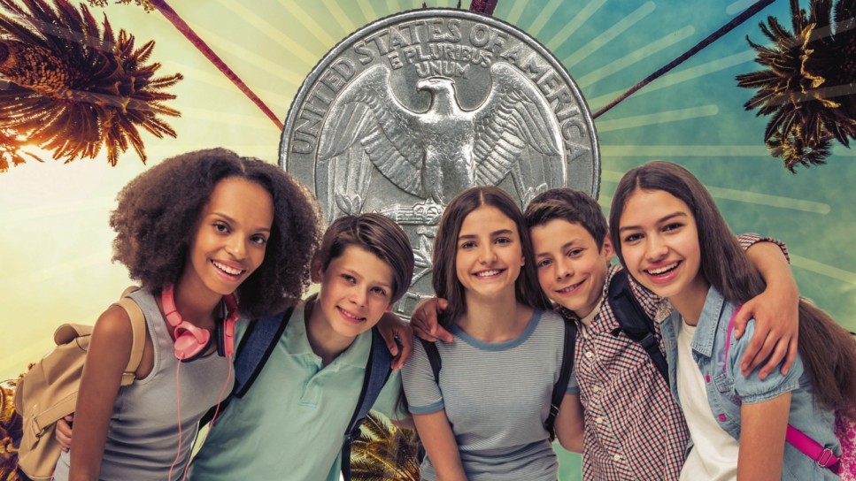 Photo of school kids under palm trees with quarter in back ground