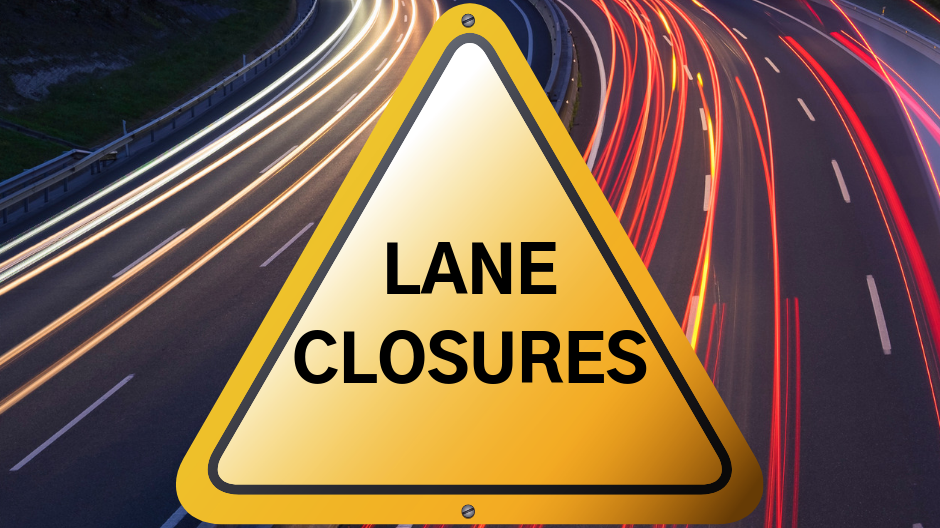 photo of night traffic with a street sign saying lane closures