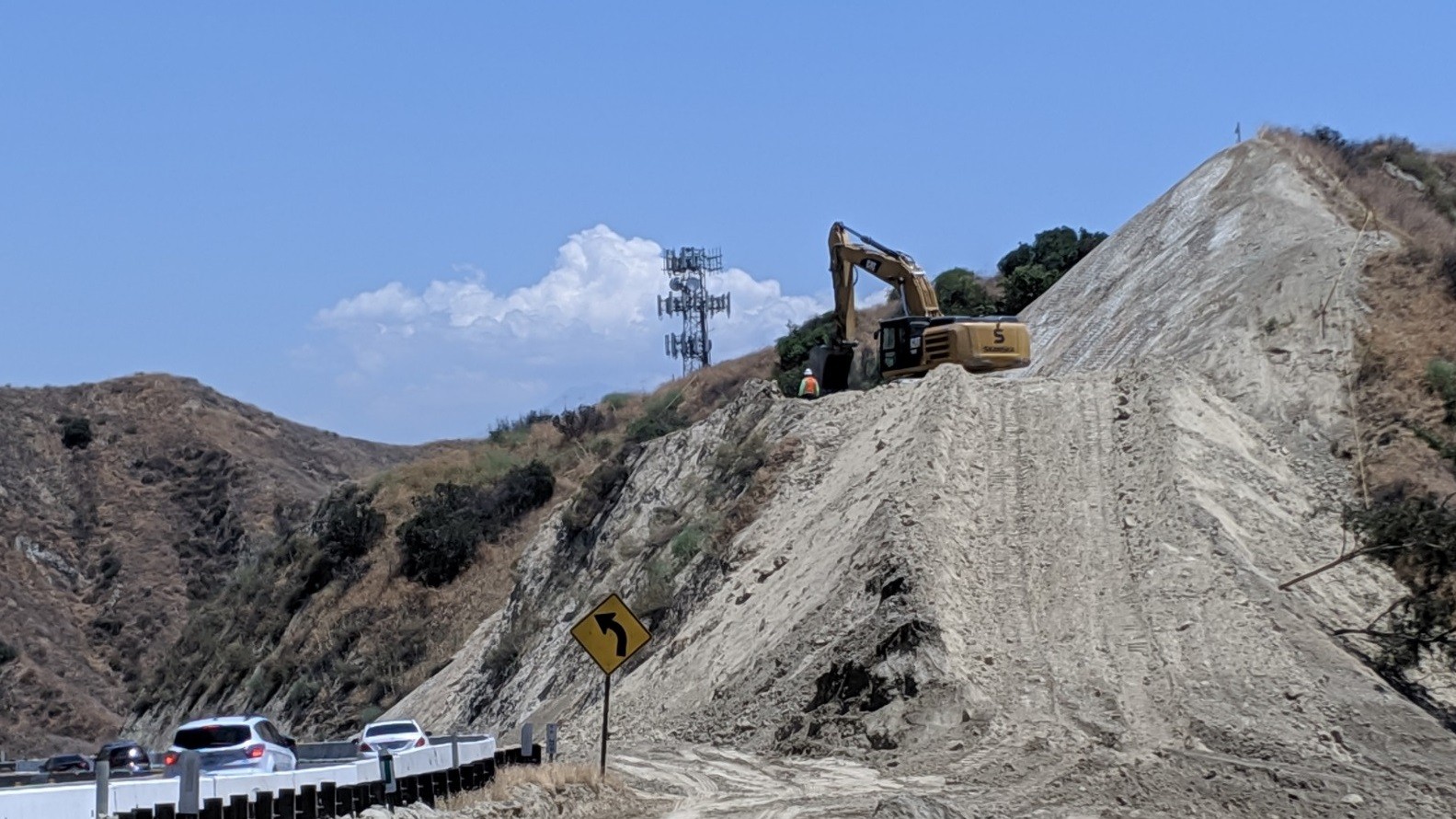 Excavator on hill