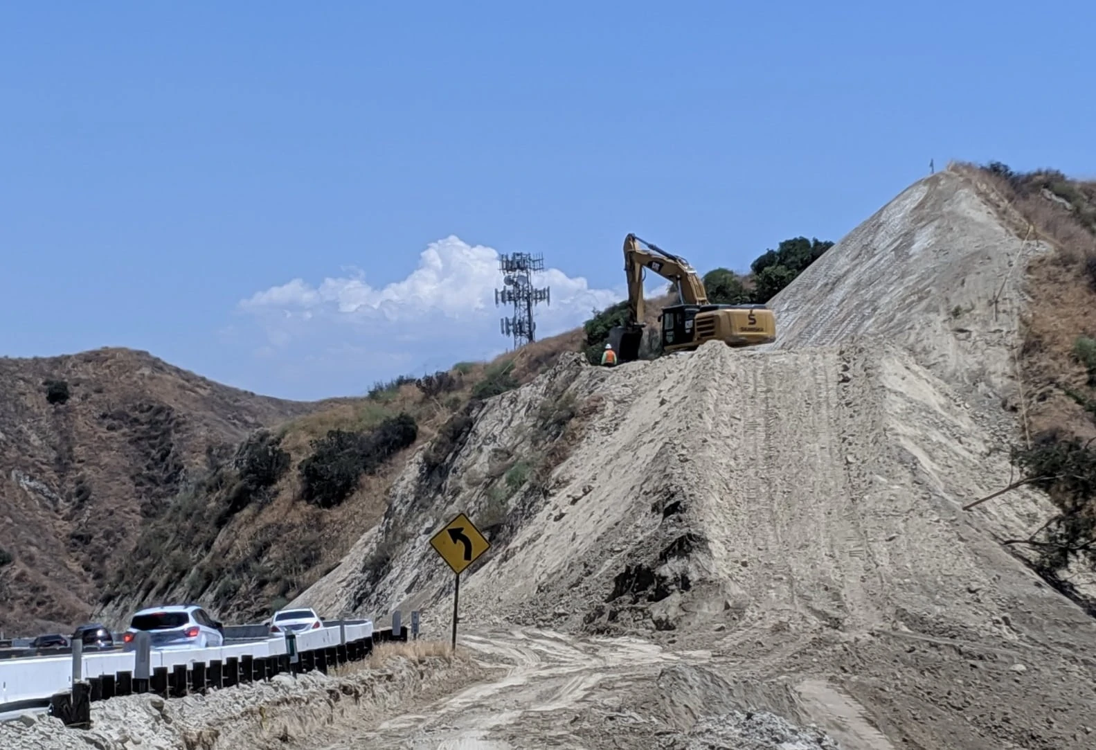 Excavator on hill