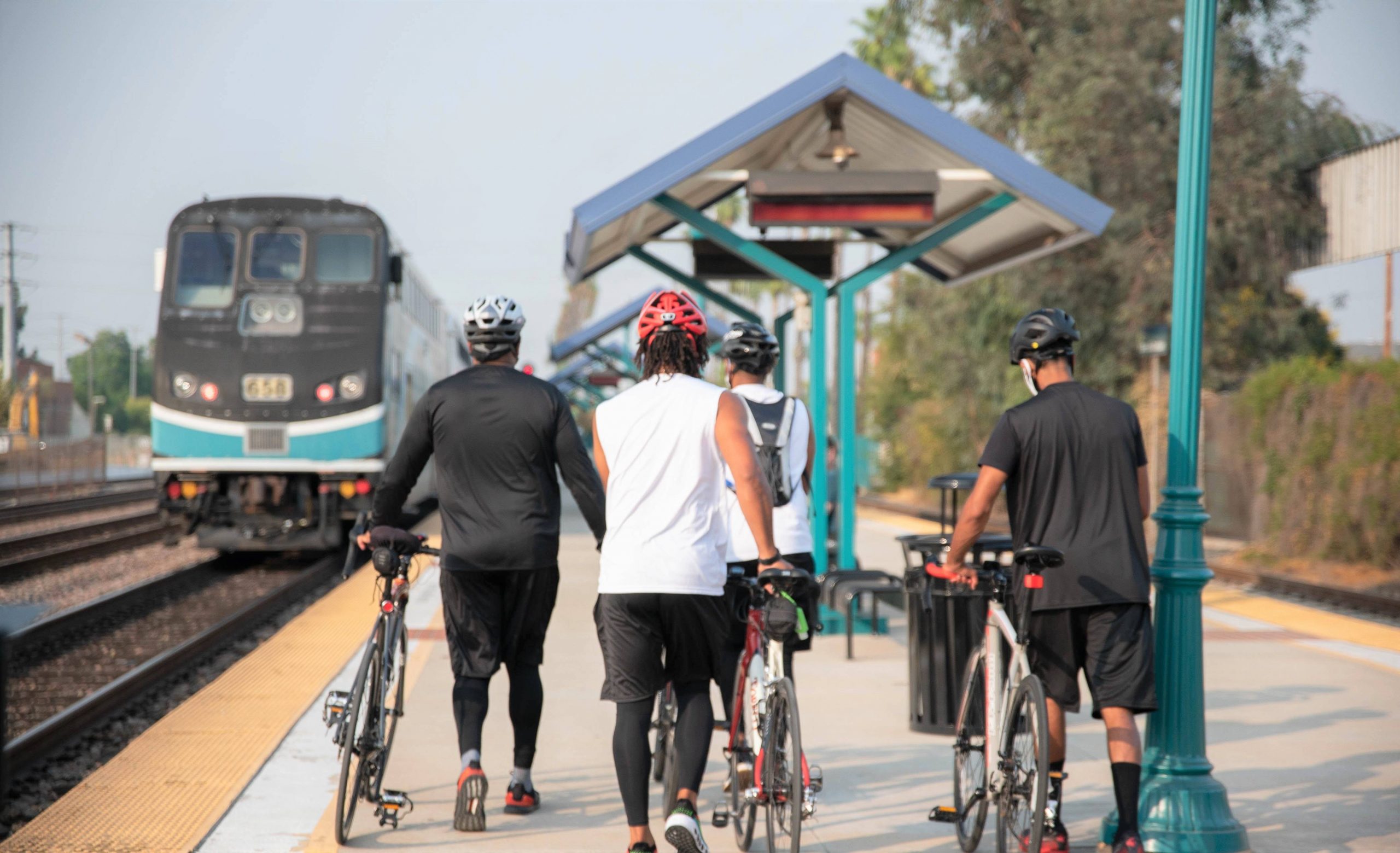 People with bikes walking/waiting for Metrolink train