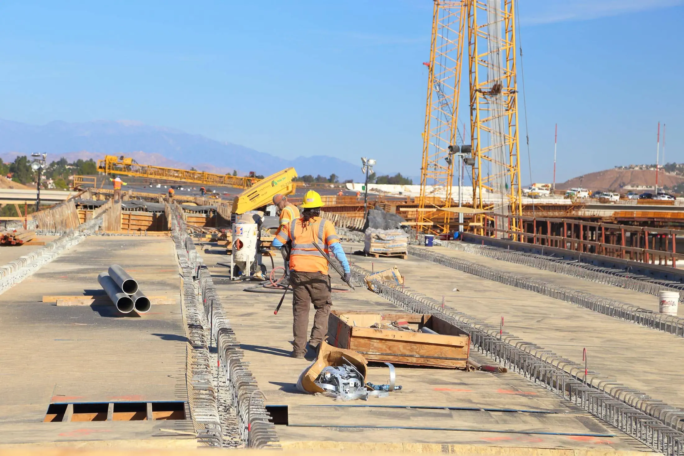 Construction crew working no highway project in Riverside County